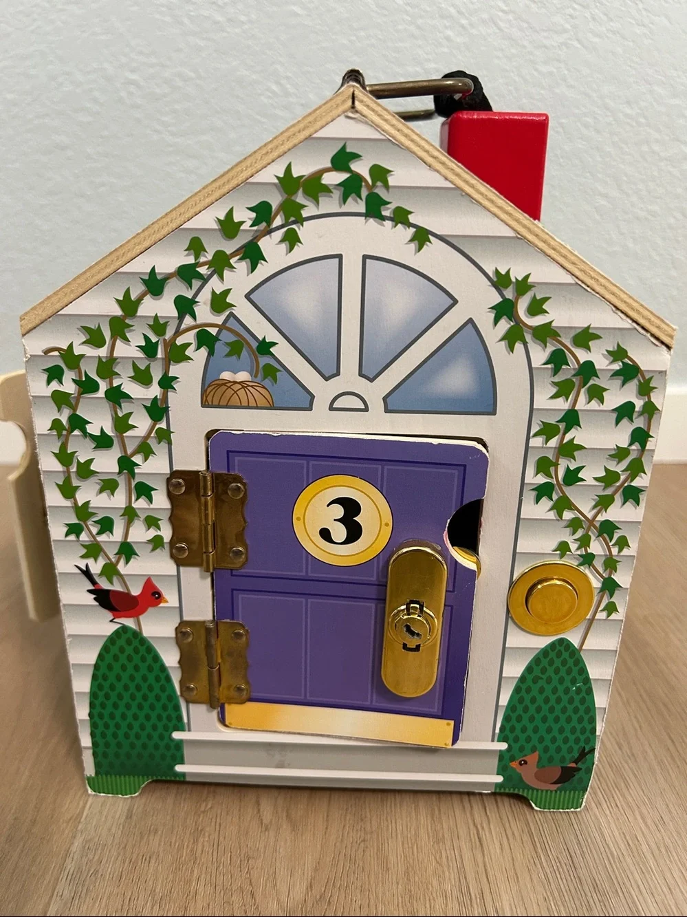 Melissa & DougTake-Along Wooden Doorbell Dollhouse -Doorbell Sounds, Keys-Toy